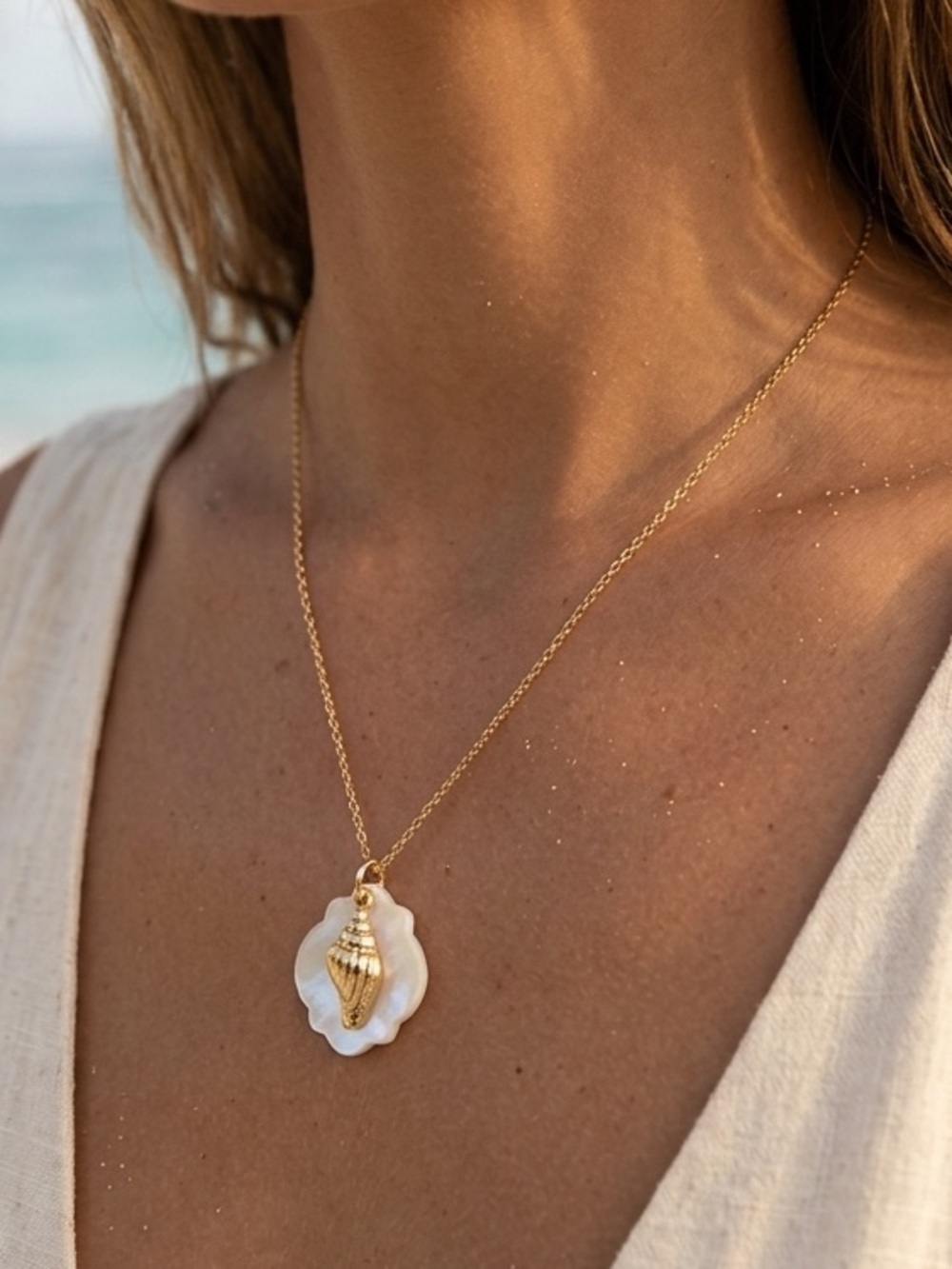 Gold Shell Pendant Necklace with White Mother-of-Pearl Accent